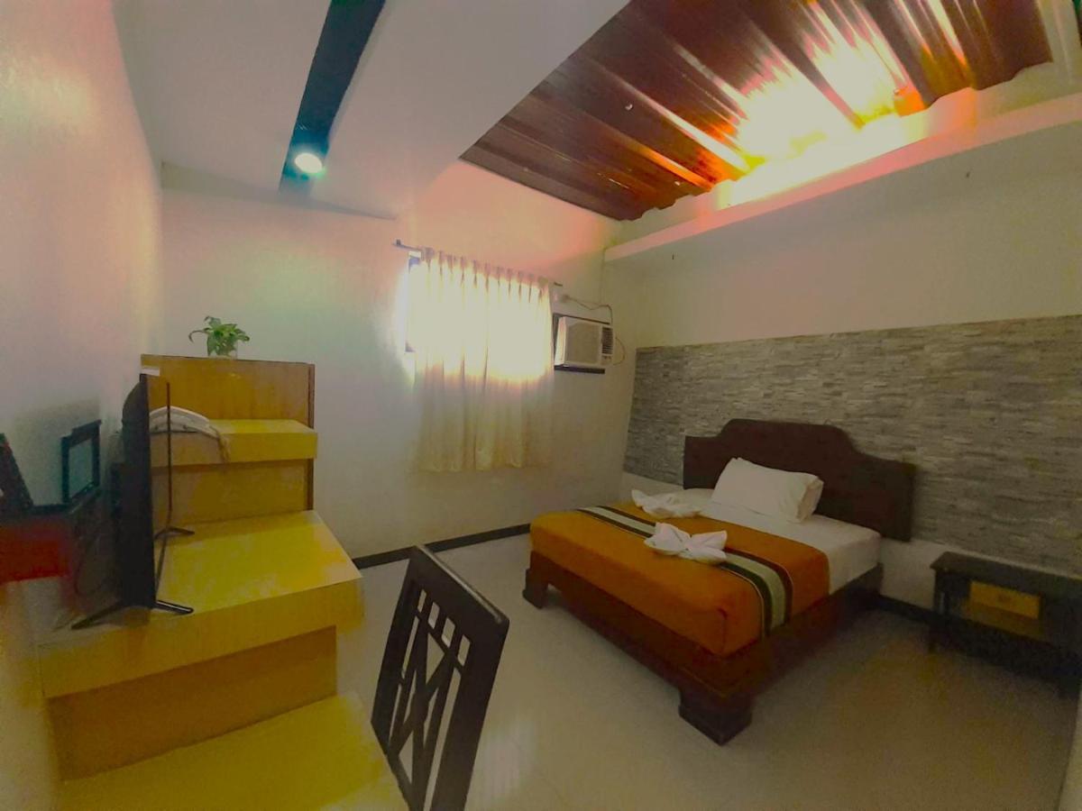 Melsol Hotel Bantay Buitenkant foto