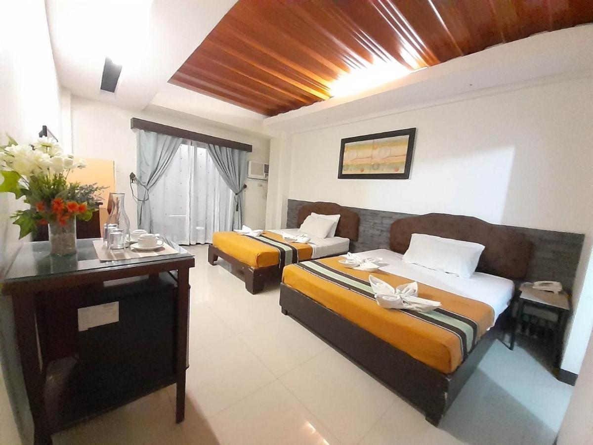 Melsol Hotel Bantay Buitenkant foto