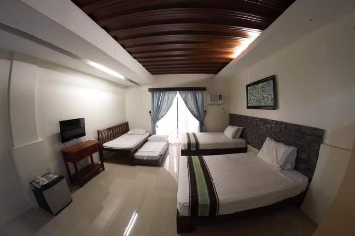 Melsol Hotel Bantay Buitenkant foto