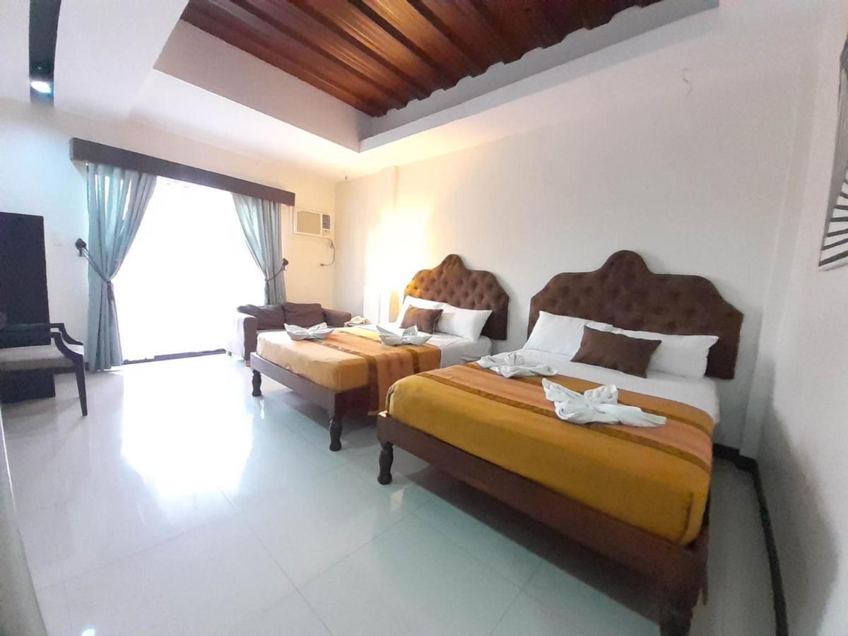 Melsol Hotel Bantay Buitenkant foto