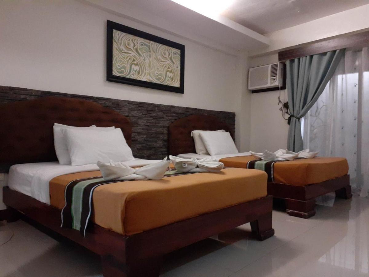Melsol Hotel Bantay Buitenkant foto