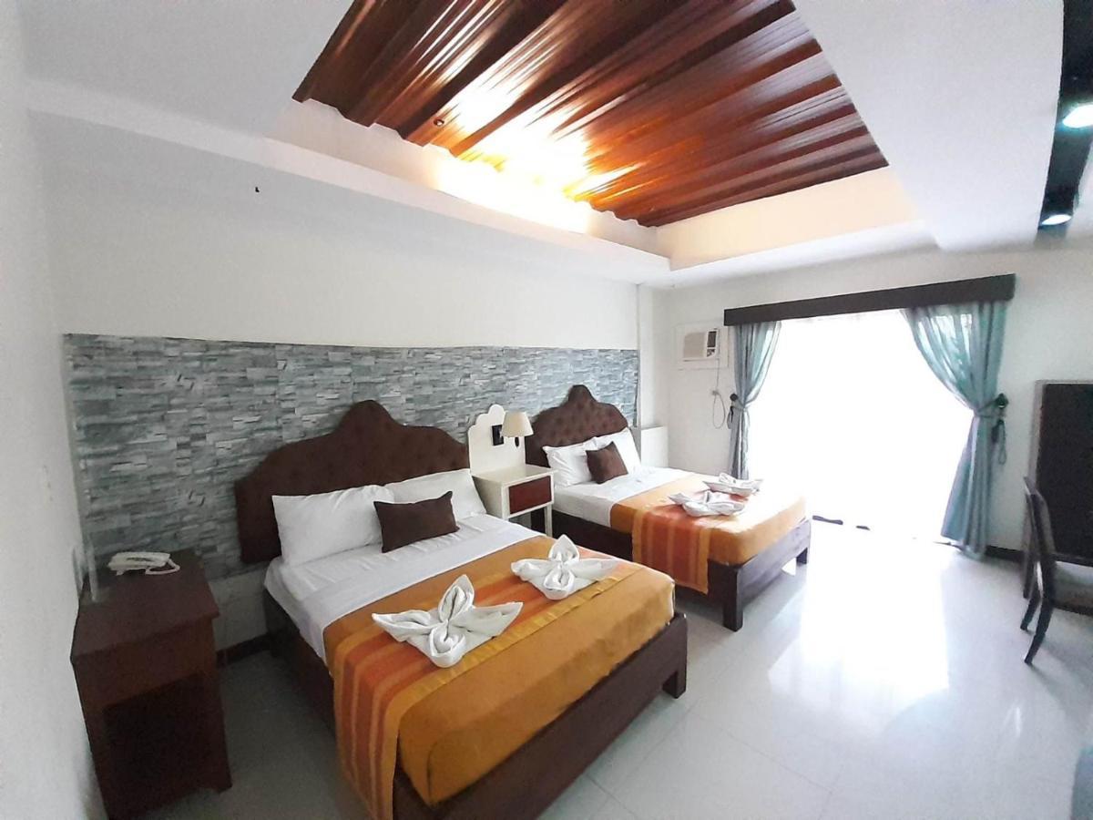 Melsol Hotel Bantay Buitenkant foto