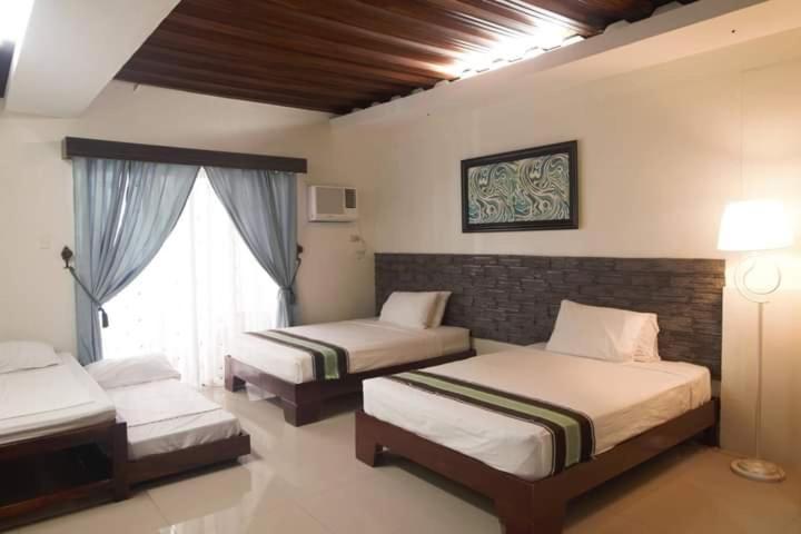 Melsol Hotel Bantay Buitenkant foto
