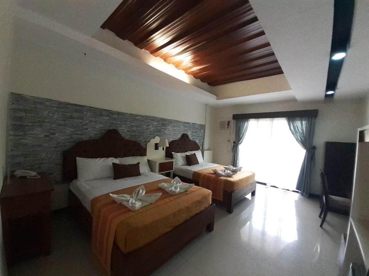 Melsol Hotel Bantay Buitenkant foto