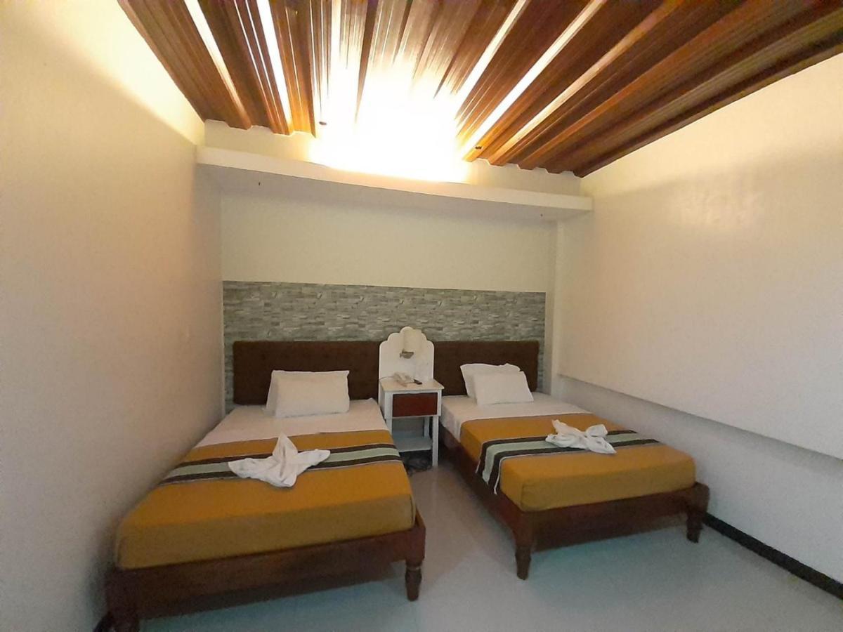 Melsol Hotel Bantay Buitenkant foto
